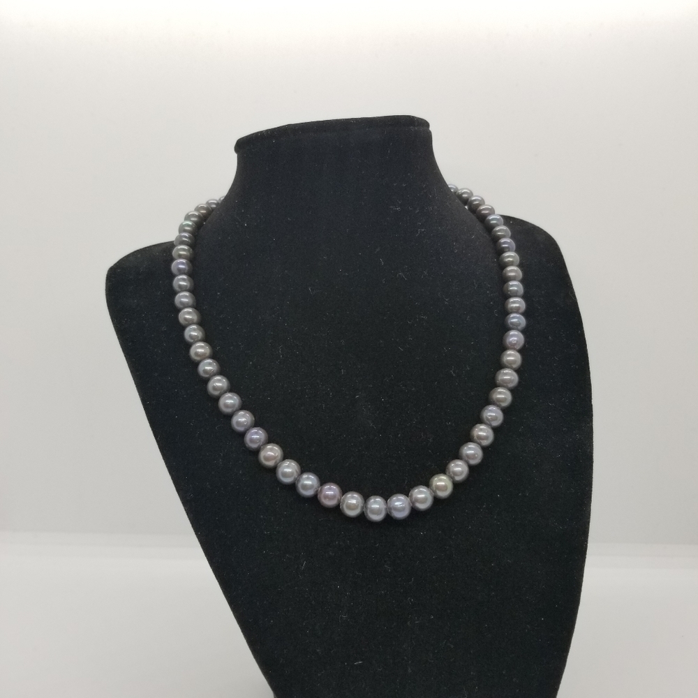 single strand round black pearls